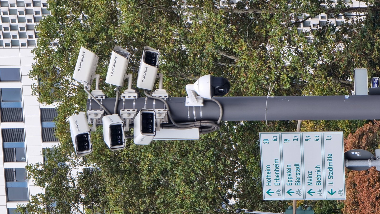 A pole-mounted surveillance camera