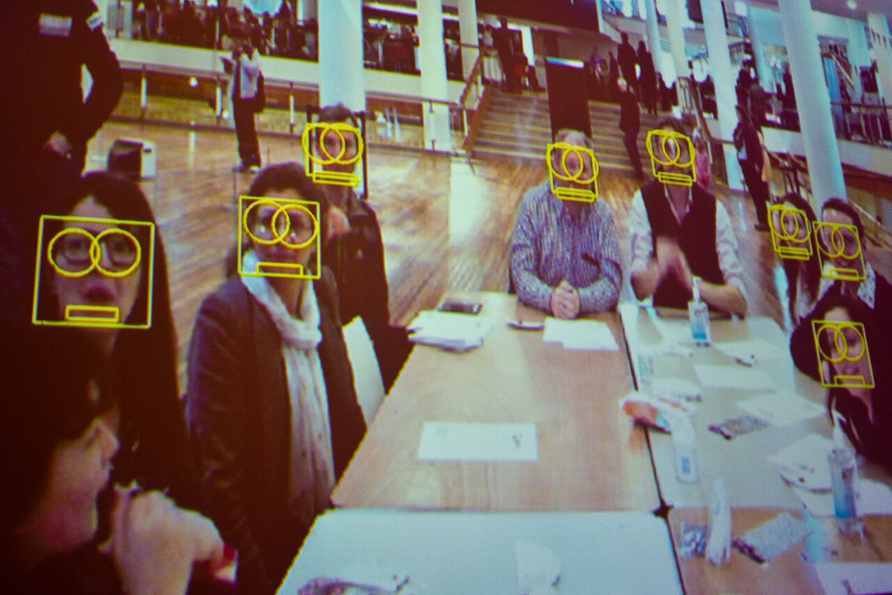 Facial-recognition software detecting faces in a crowd